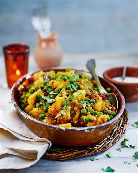 spiced-potatoes-and-peas-recipe-delicious-magazine image