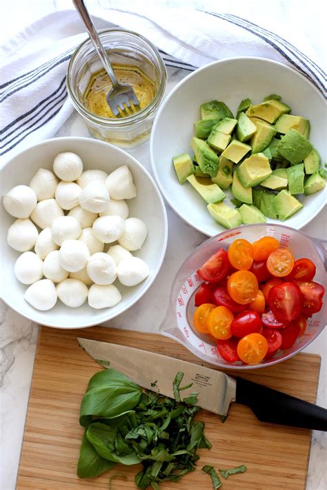 tomato-mozzarella-avocado-salad-green-valley-kitchen image