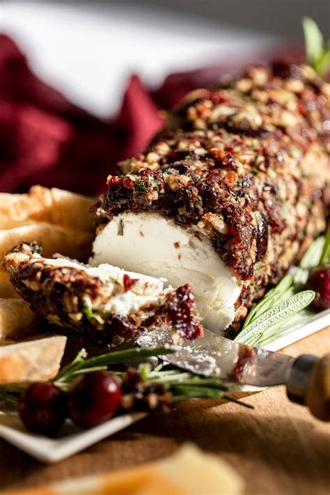 homemade-cranberry-pecan-goat-cheese-log-fork-in image