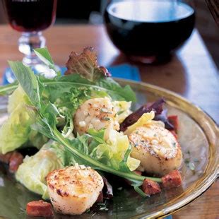 sauted-scallops-with-andouille-and-baby-greens image