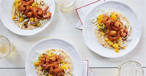 shrimp-tacos-with-mango-salsa-recipe-purewow image