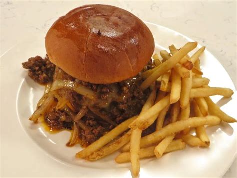 down-home-chili-cheeseburger-with-fries-cooking image