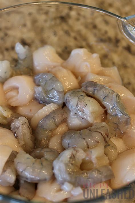 grilled-scallops-and-shrimp-over-lemony-garlic-butter image