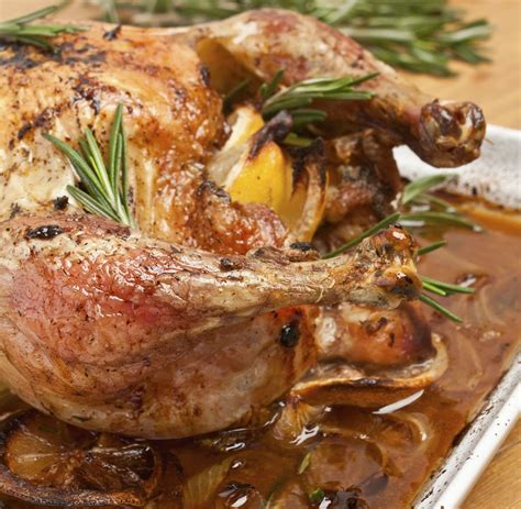 wine-and-herb-basted-roast-turkey-with-white-wine-pan image