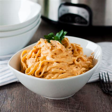 easy-crockpot-buffalo-chicken-pasta-eating-on-a-dime image
