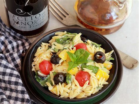 mediterranean-orzo-pasta-salad-with-feta-vinaigrette image