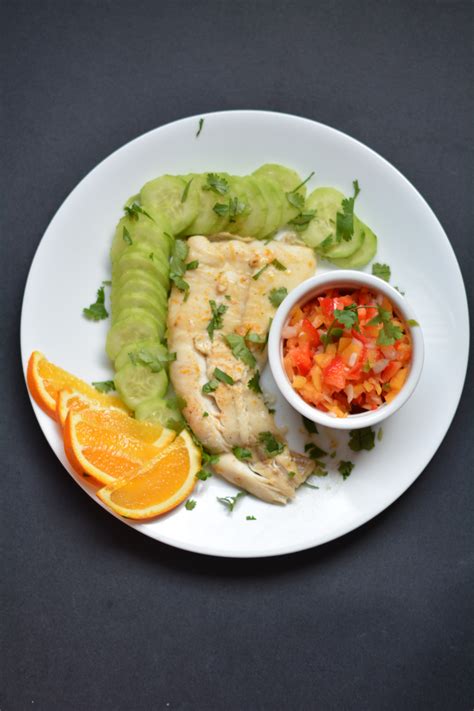 zesty-halibut-with-peach-pico-de-gallo-served-with image