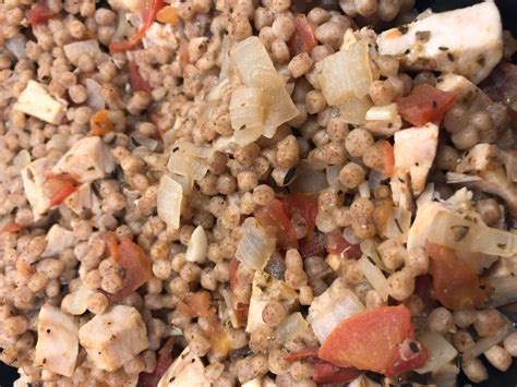 pearled-couscous-with-chicken-and-tomatoes image