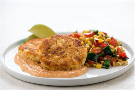 creole-fish-cakes-with-chipotle-crema-recipe-home image