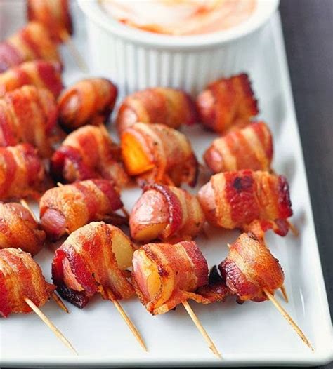 bacon-wrapped-potato-bites-with-spicy-sour-cream image