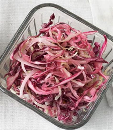 tangy-hot-cabbage-slaw-recipe-country-living image