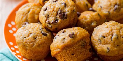 mini-pumpkin-chocolate-chip-muffins-delish image