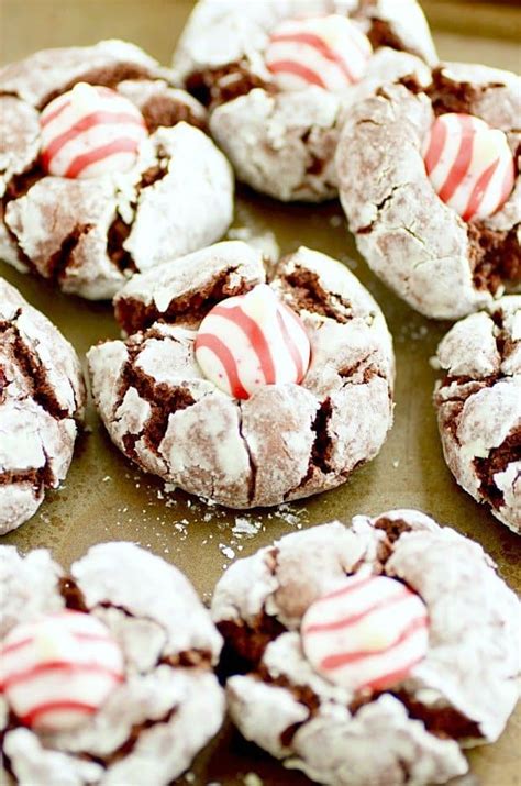 chocolate-crinkle-candy-cane-kiss-cookies image
