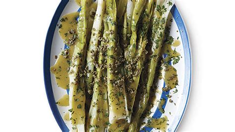poached-leeks-with-capers-and-mustard-vinaigrette image