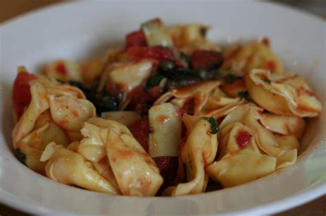 a-summer-dinner-of-ravioli-pasta-and-tomato-salad image