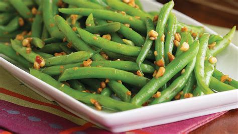 brown-butter-green-beans-with-pine-nuts-finecooking image
