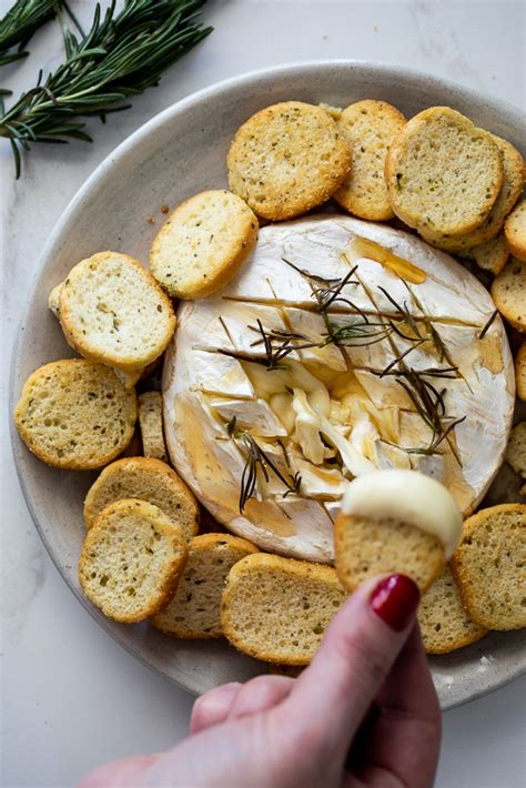 easy-baked-brie-with-honey-and-sage-simply-delicious image