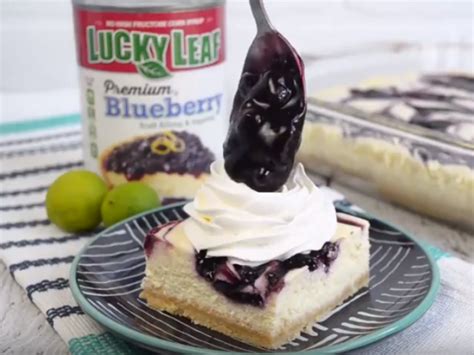blueberry-key-lime-cheesecake-bars-lucky-leaf image