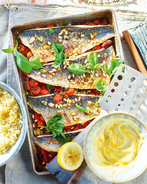 sea-bass-traybake-with-peppers-and-pine-nuts image