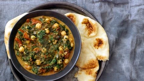 curried-chickpeas-with-spinach-and-tomatoes-recipe-bon-apptit image