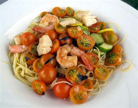 shrimp-scallops-tossed-with-cherry-tomatoes-basil image