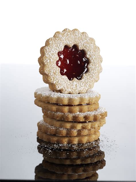 raspberry-almond-linzer-cookies-recipe-real-simple image