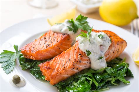 baked-salmon-with-sauted-spinach-joy-bauer image