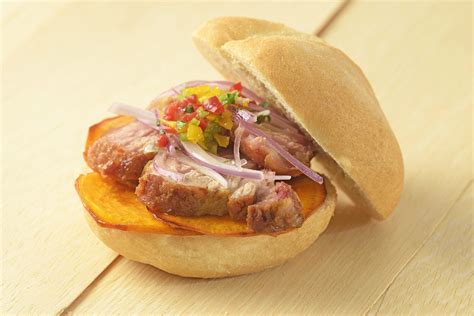 pan-con-chicharrn-pork-potato-sandwich-peruvian image