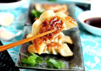 pan-fried-pork-and-cilantro-chinese-dumplings-tasty image
