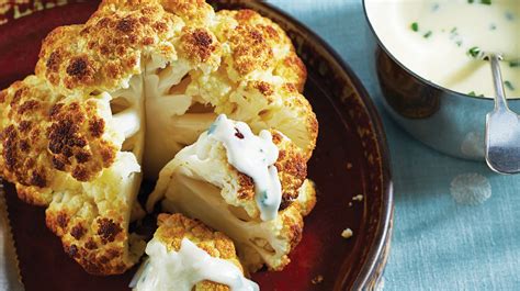 whole-roasted-cauliflower-with-cheddar-sauce image
