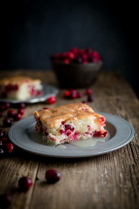 cranberry-pudding-cake-with-warm-butter-sauce image
