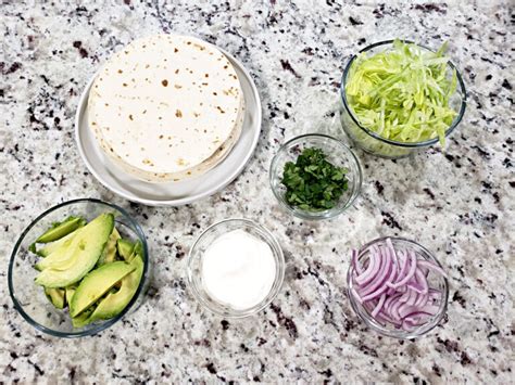 slow-cooker-shredded-chicken-tacos-the-toasty-kitchen image