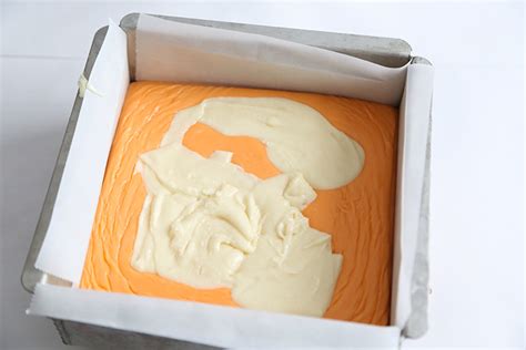 creamy-orange-marbled-fudge-sprinkle-bakes image