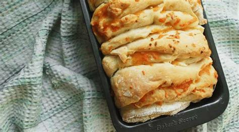 cheesy-herb-pull-apart-bread-recipe-flavorite image
