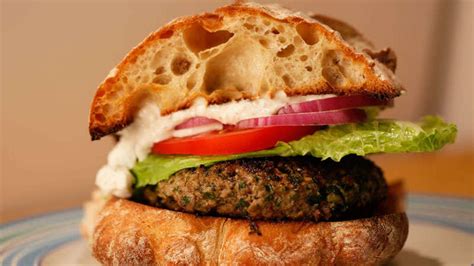 greek-burgers-with-feta-sauce-recipe-rachael-ray-show image