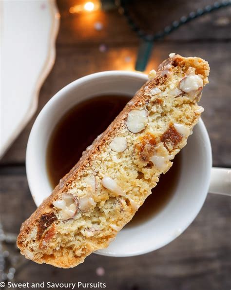 apricot-and-almond-biscotti-with-white-chocolate-drizzle image