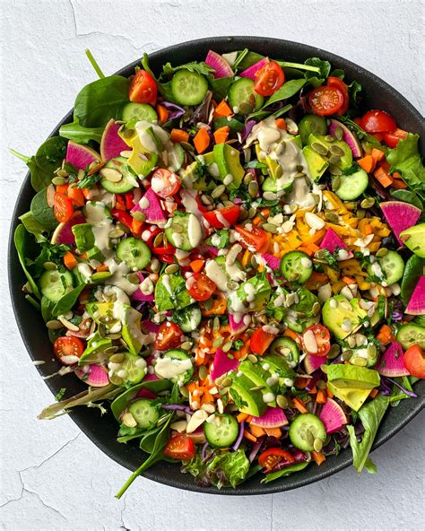 rainbow-vegan-chop-salad-with-orange-tahini-dressing image