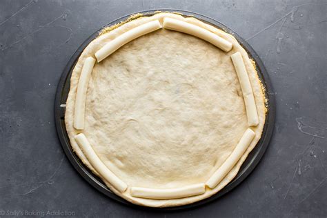 how-to-make-stuffed-crust-pizza-sallys-baking-addiction image
