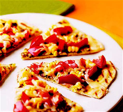 rustic-grilled-pizza-with-fresh-corn-tomatoes-and-basil image