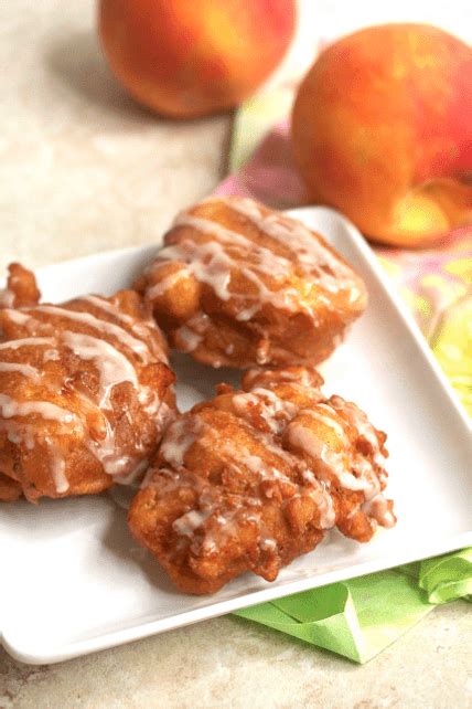 the-most-heavenly-deep-fried-peach-fritters-ever image