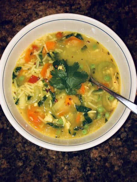 the-best-hearty-chicken-and-rice-soup-with-veggies image