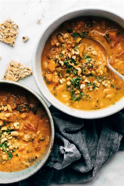 spicy-peanut-soup-with-sweet-potato-kale image
