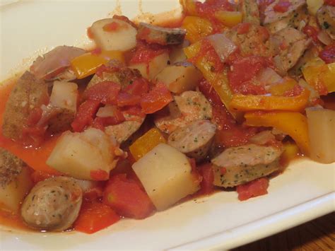 crock-pot-sausage-peppers-and-potatoes-cucina image