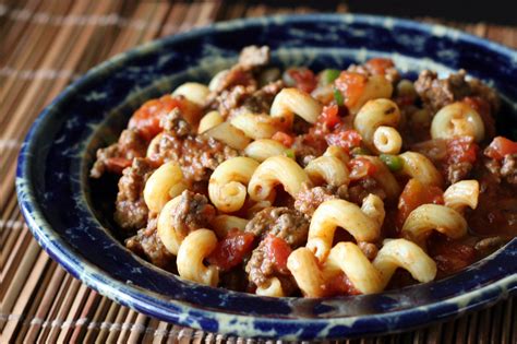 spicy-pasta-with-ground-beef-and-tomatoes image