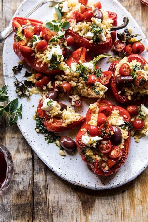 greek-orzo-stuffed-red-peppers-with-lemony-basil image
