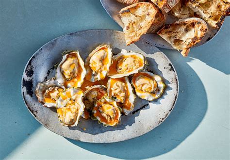 grilled-oysters-with-hot-sauce-butter-east-coast image