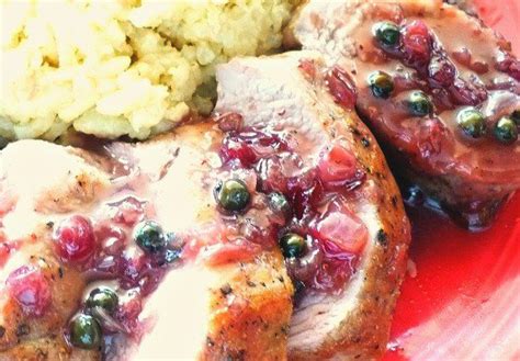 pork-tenderloin-with-lingonberry-peppercorn-sauce image