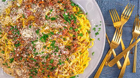 bolognese-sauce-with-tagliatelle-recipe-rachael-ray image
