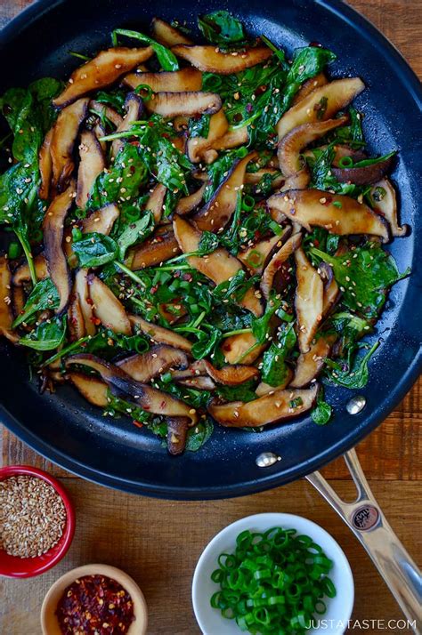 sauted-mushrooms-and-spinach-with-spicy-garlic-sauce image