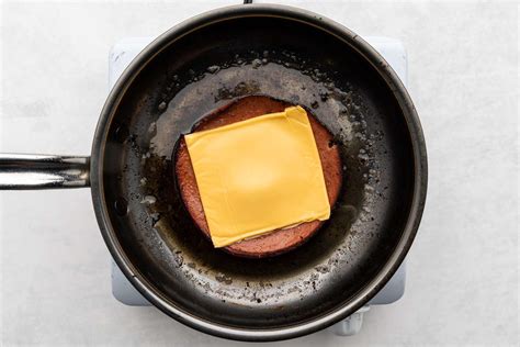 fried-bologna-and-cheese-sandwich-recipe-the-spruce image